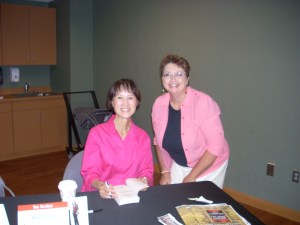 Best-selling author Tess Gerritsen poses with me during a book signing.