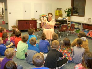Medusa sans her snakes talks to students at Southern Wells Ele.
