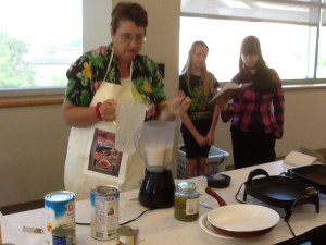 Preparing the pina colada recipe from my Now You're Cooking: Cuba cookbook. 