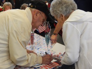 WWII vets signed copies of WWII Legacies which they were featured in. 