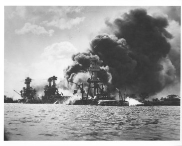 Burning and damaged ships at PHa result of Jap attack, 12-7-41. L. to R. USS AZ, USS TN, USS WV